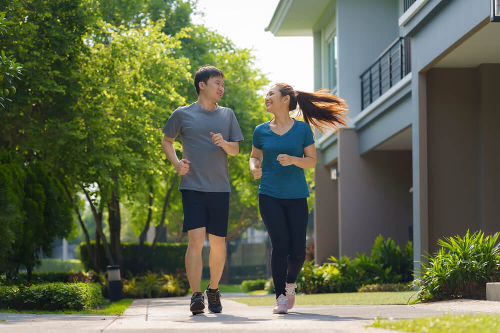 A healthy couple jogging together. Bird's nest greatly benefits health conscious individuals.